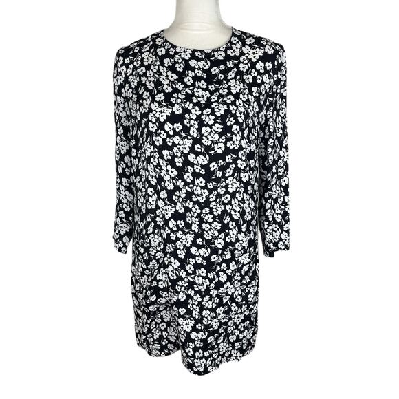 black sleeveless wrap dress Sleeveless Embroidered Wrap Dress with Tiers in Black Textured Eyelet in Black / S